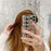 Coque iPhone en métal avec chaîne